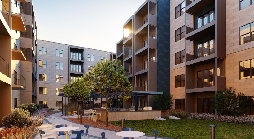 Find your perfect fit at FUZE Ballpark a building with a table and chairs